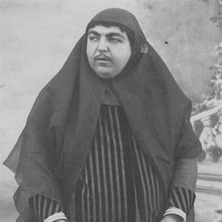 A picture of Princess Qajar with her father King Naser Al-din Shah and her siblings