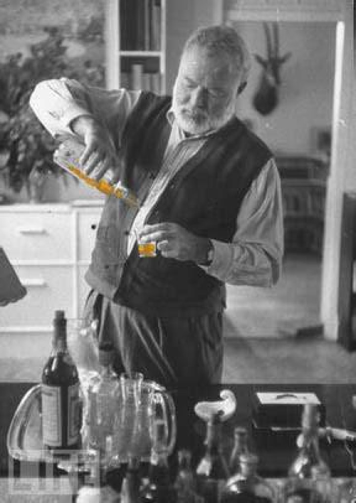 Ernest Hemingway Pouring A Drink