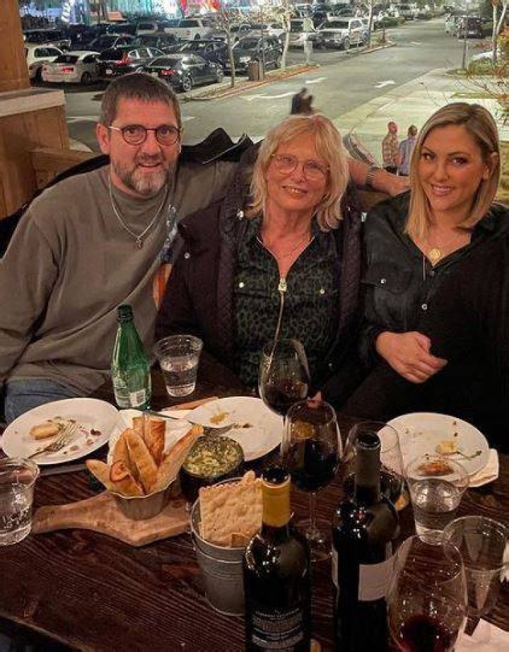 Gina Kirschenheiter with her father and mother