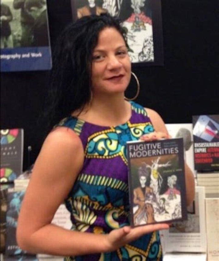 Jessica Krug With Her Book