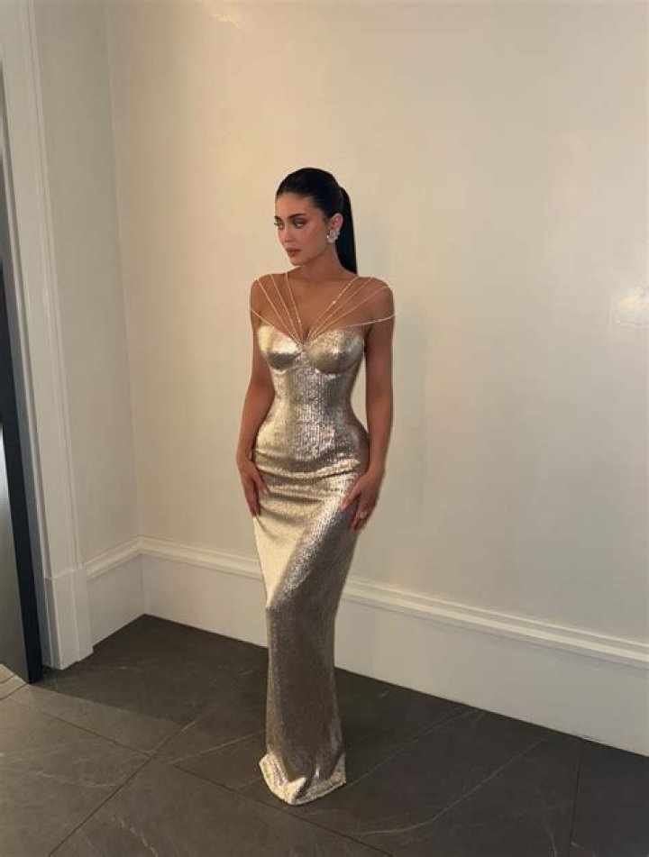 Kylie Jenner gold outfit gold makeup kourtney kardashians 40th birthday