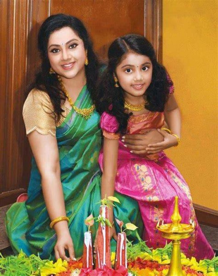 Meena with her daughter