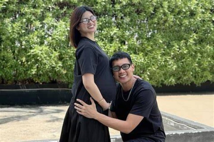Scottie Thompson with his wife